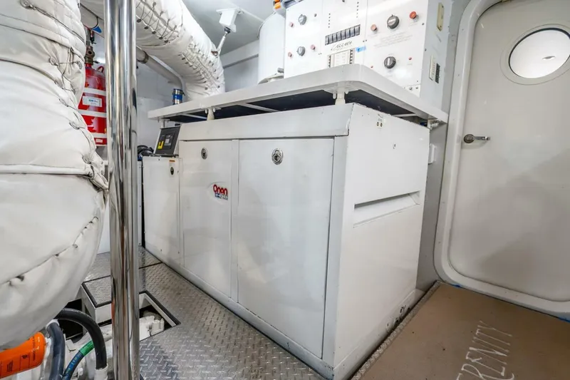 Slide: The Image of Engine room of 2008 Lazzara Motor Yacht with control panels and equipment. - 83