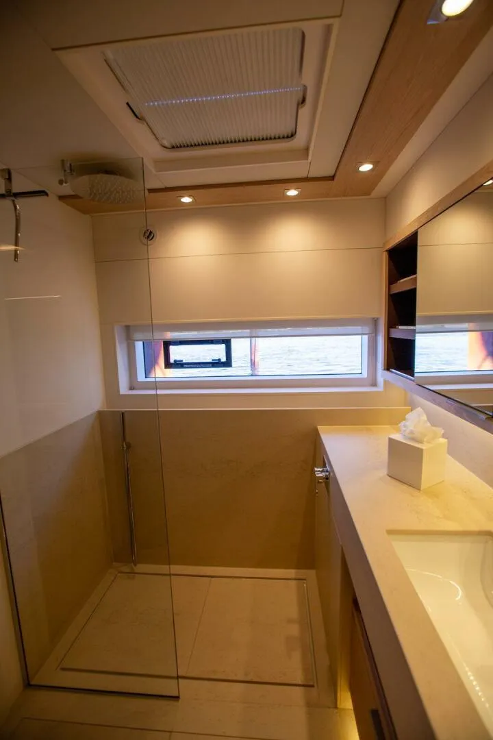 Slide: The Image of Luxurious bathroom interior of 2021 Lagoon Seventy 7 yacht with modern fixtures. - 25