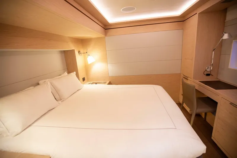 Slide: The Image of Luxurious cabin interior of 2021 Lagoon Seventy 7 yacht with modern furnishings. - 29