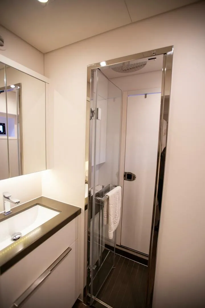 Slide: The Image of Luxurious bathroom in 2021 Lagoon Seventy 7 yacht with sleek shower and modern sink. - 38