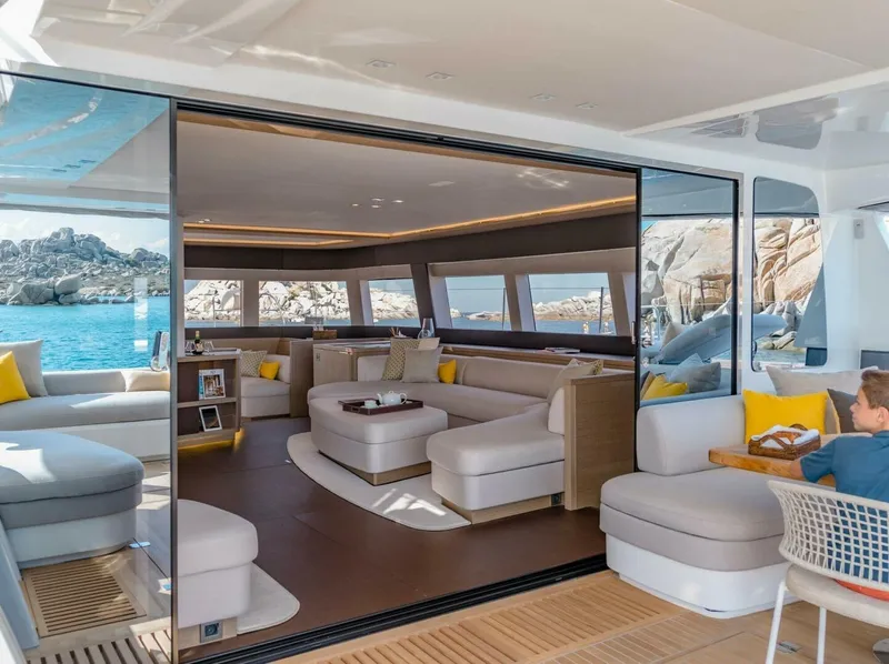 Slide: The Image of Luxurious interior of 2021 Lagoon Seventy 7 yacht with modern seating and ocean view. - 4