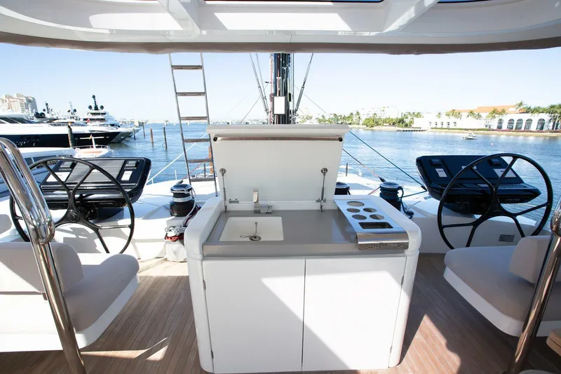 Slide: The Image of Luxury Lagoon Seventy 7 yacht deck with outdoor kitchen, 2021 model. - 49