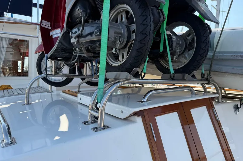 Slide: The Image of Wooden cabinet on 1996 Grand Banks 42 Classic yacht deck. - 18