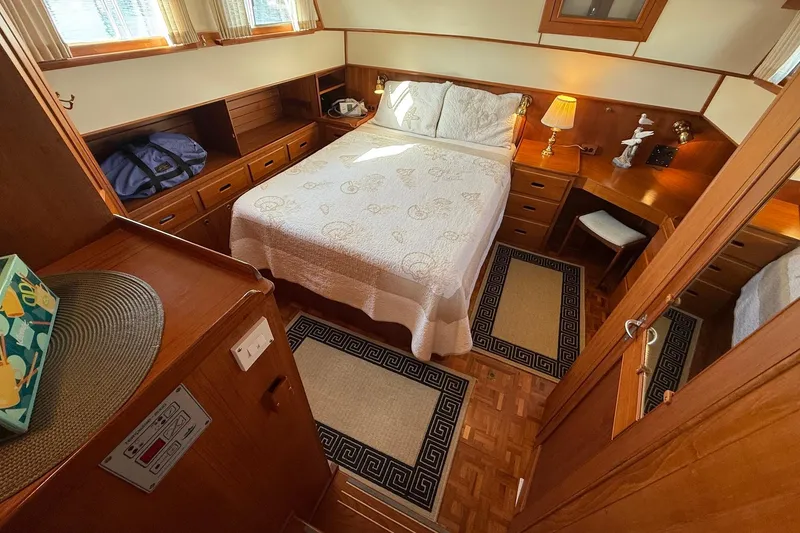 Slide: The Image of Interior of 1996 Grand Banks 42 Classic yacht with wooden stairs and cabinetry. - 31