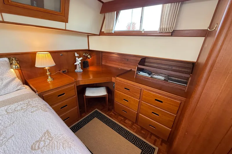 Slide: The Image of Bathroom interior of 1996 Grand Banks 42 Classic yacht, featuring sink, toilet, and shower. - 33