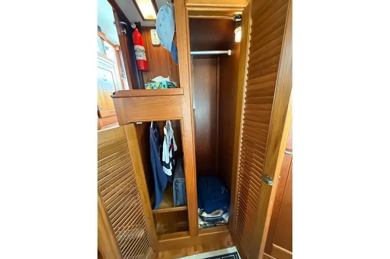 Slide: The Image of Bathroom interior of 1996 Grand Banks 42 Classic yacht, featuring sink and toilet. - 40