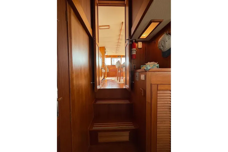 Slide: The Image of Wooden interior of 1996 Grand Banks 42 Classic yacht with louvered cabinet doors. - 41