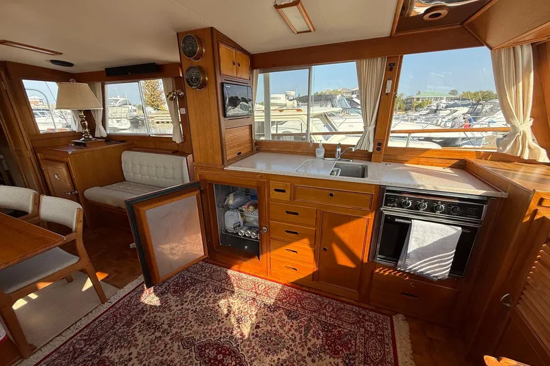 Slide: The Image of Kitchen sink and countertop on a 1996 Grand Banks 42 Classic yacht. - 57
