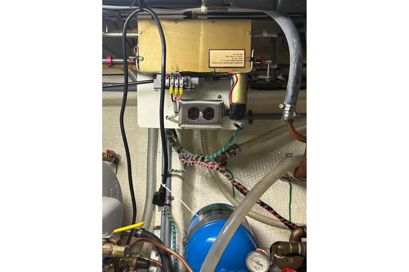 Slide: The Image of Engine room wiring and components of a 1996 Grand Banks 42 Classic yacht. - 69