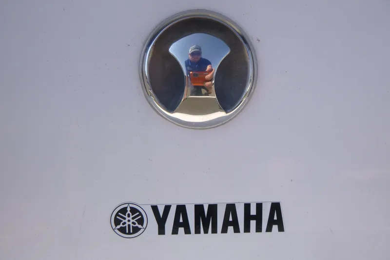 Slide: The Image of 2015 Yamaha SX192 boat emblem with reflective surface and logo. - 6