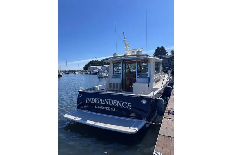 Slide: The Image of 2012 Sabre 42 Salon Express yacht docked, named "Independence," in Yarmouth, ME. - 1