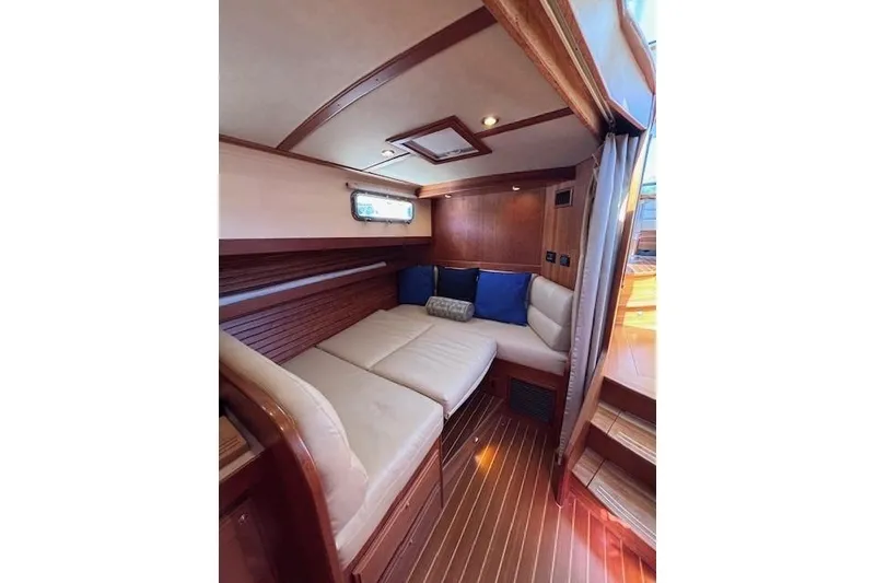 Slide: The Image of Luxurious interior of 2012 Sabre 42 Salon Express yacht with cozy seating and wooden accents. - 19