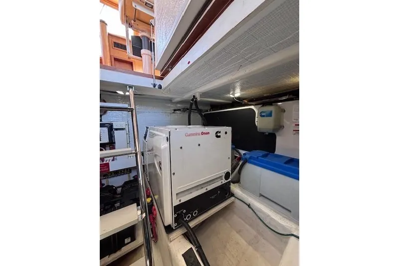 Slide: The Image of Engine room of 2012 Sabre 42 Salon Express with Cummins Onan generator. - 39
