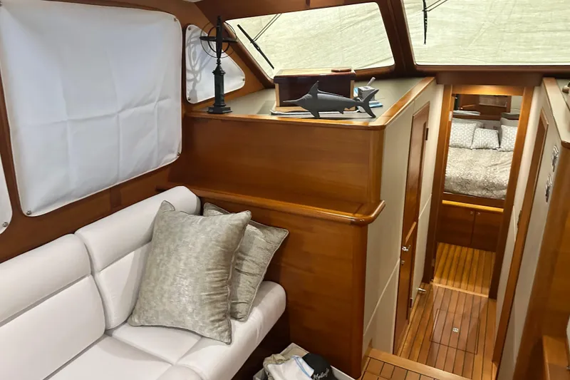 Slide: The Image of Luxurious interior of 2017 Palm Beach PB42 yacht with elegant wood finish and cozy seating. - 19
