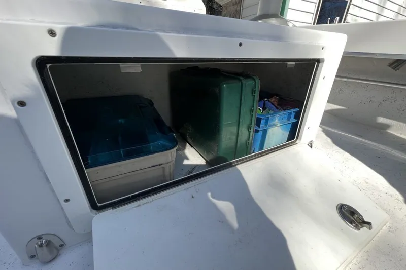 Slide: The Image of Storage Below Helm Seats - 4