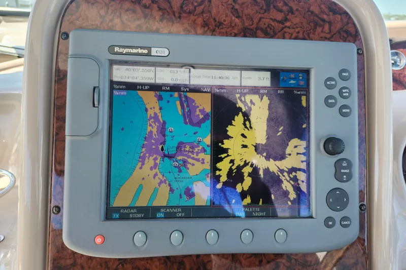 Slide: The Image of Raymarine C120 navigation display on 2002 Sea Ray 410 Sundancer boat dashboard. - 20