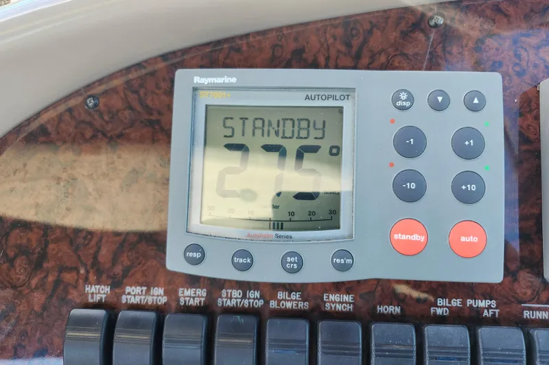 Slide: The Image of Raymarine autopilot display on 2002 Sea Ray 410 Sundancer, showing standby mode at 275 degrees. - 22