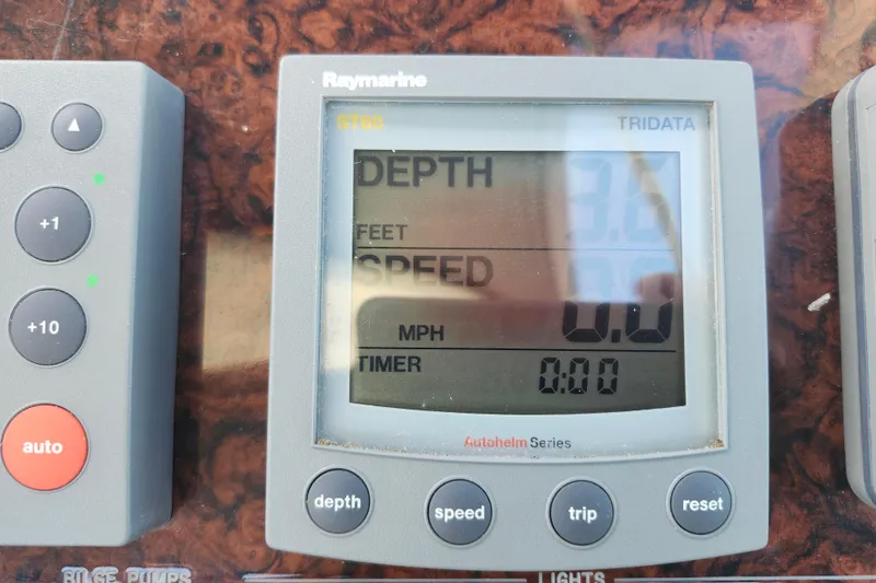 Slide: The Image of Raymarine ST60 Tridata display on 2002 Sea Ray 410 Sundancer showing depth and speed. - 23