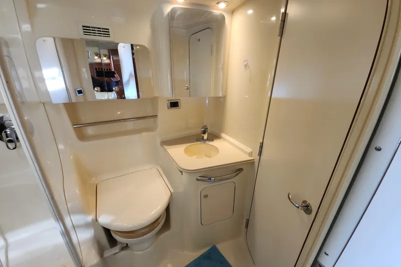 Slide: The Image of Luxurious bathroom in 2002 Sea Ray 410 Sundancer yacht, featuring modern amenities. - 36