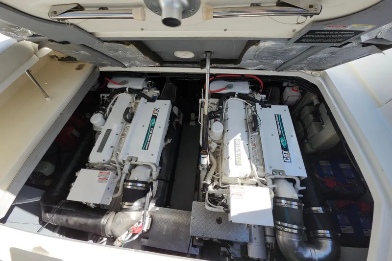 Slide: The Image of Engine compartment of a 2002 Sea Ray 410 Sundancer with twin Caterpillar engines. - 39