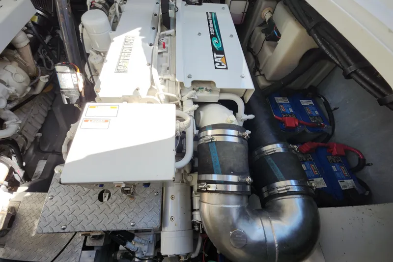 Slide: The Image of Engine room of 2002 Sea Ray 410 Sundancer with Caterpillar marine engine. - 43