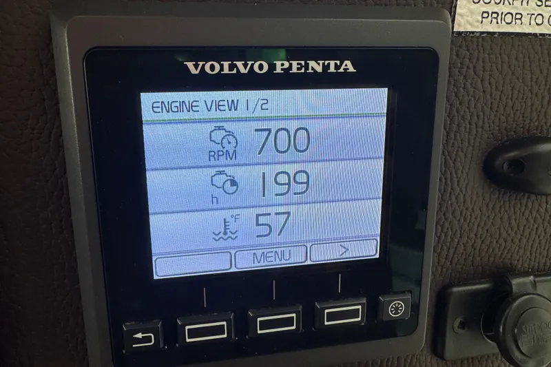 Slide: The Image of Volvo Penta engine display on 2019 Ranger Tugs R-31 S, showing RPM, hours, and temperature. - 14