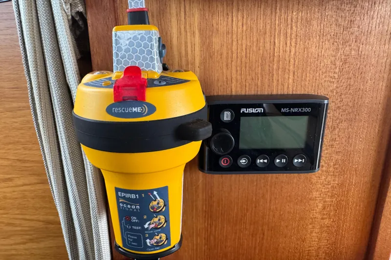 Slide: The Image of EPIRB and Fusion MS-NRX300 on 2019 Ranger Tugs R-31 S boat interior. - 44