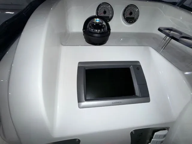 Slide: The Image of Control panel of 2015 Brig Inflatables Eagle 780 with compass and Garmin display. - 10