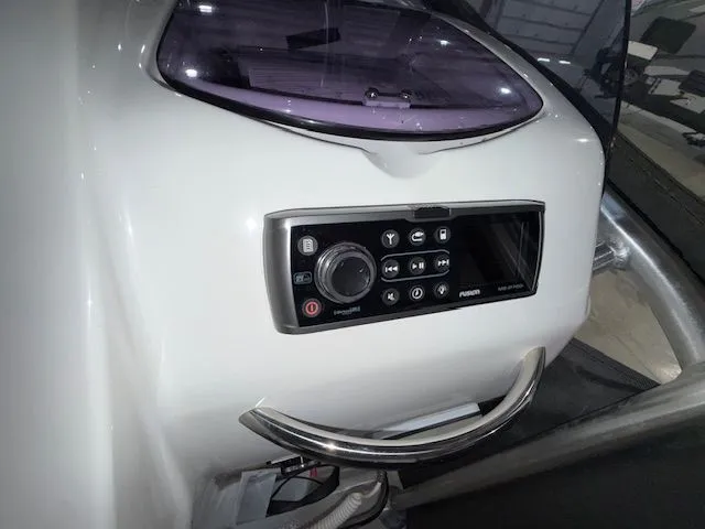 Slide: The Image of Control panel on 2015 Brig Inflatables Eagle 780 boat, featuring a Fusion audio system. - 11