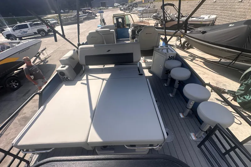 Slide: The Image of 2026 Starcraft CX 23 DL BAR pontoon boat with spacious seating and modern design. - 4