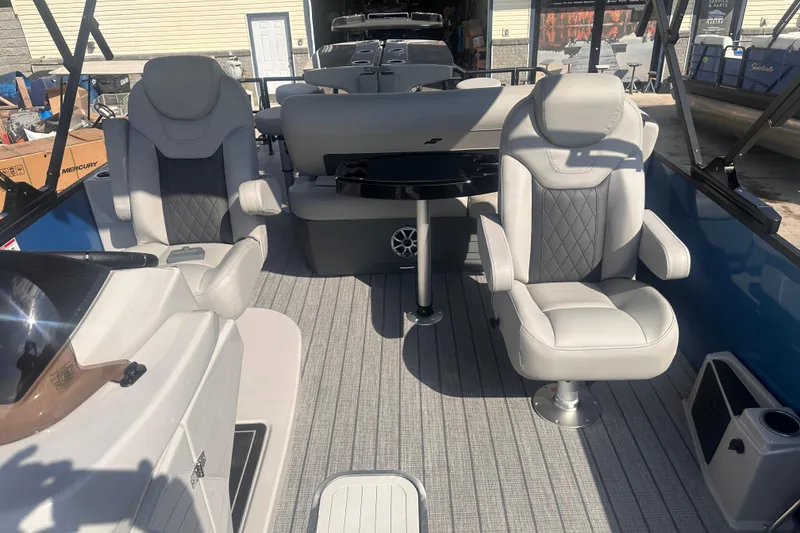 Slide: The Image of 2026 Starcraft CX 23 DL BAR boat interior with luxurious seating and modern design. - 5