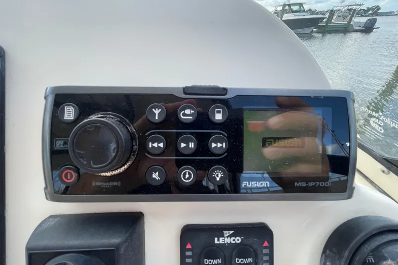 Slide: The Image of Fusion MS-IP700 marine stereo on 2015 Scout 245 Dorado boat dashboard. - 22