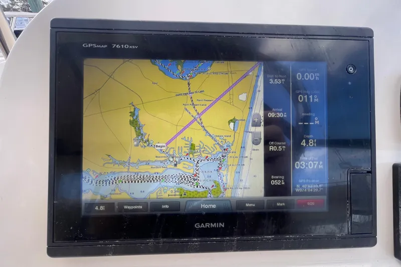 Slide: The Image of Garmin GPSMAP 7610xsv displaying nautical chart on 2015 Scout 245 Dorado boat. - 23