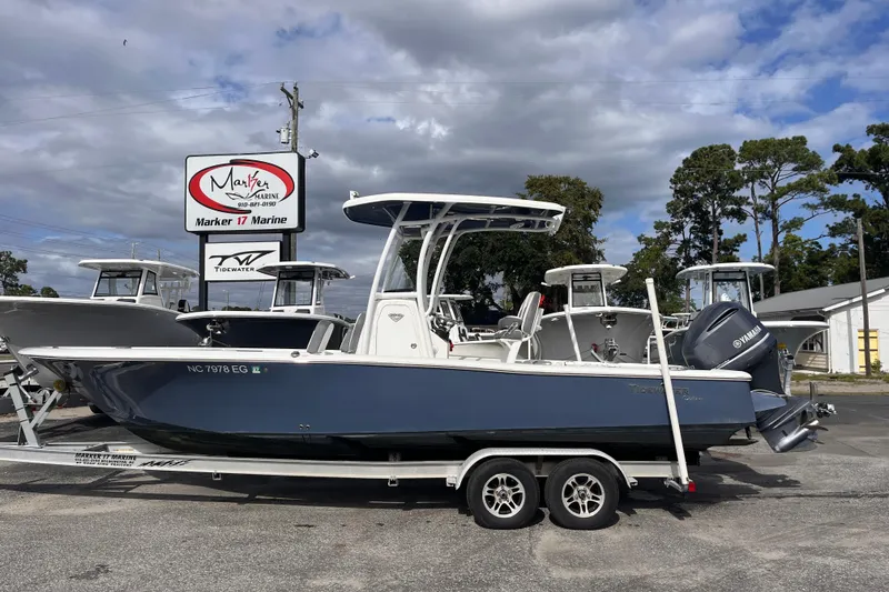 The Image of 2017 Tidewater 2500 Carolina Bay boat on trailer at Marker 17 Marine dealership. - 1