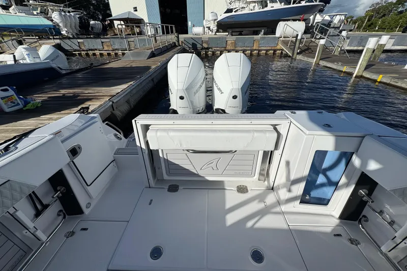 Slide: The Image of 2025 Blackfin 272 DC boat with luxurious white seating and diamond stitching. - 22