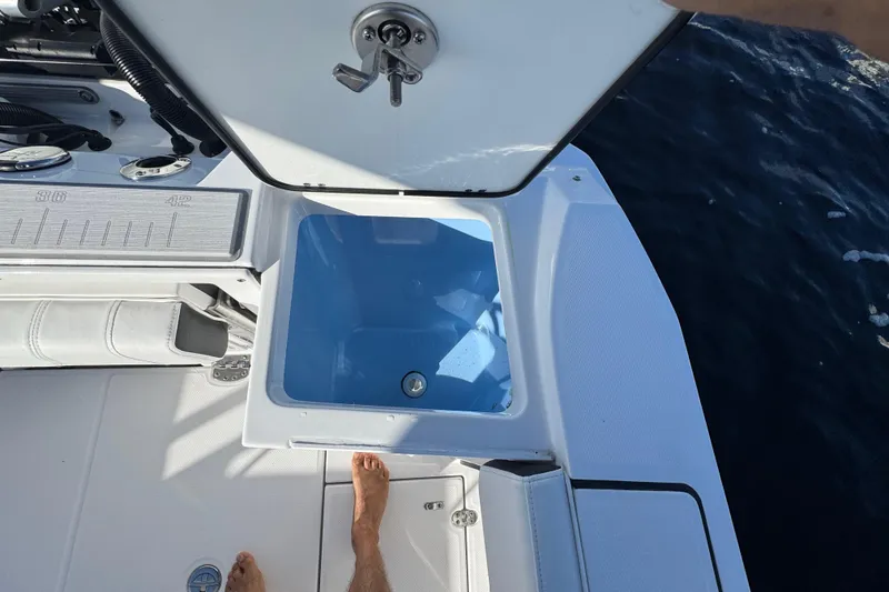 Slide: The Image of Blackfin 272 DC 2025 with Mercury engines on the water. - 23