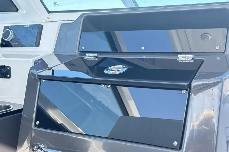 Slide: The Image of Luxurious seating on 2025 Blackfin 272 DC boat with quilted upholstery, ocean view. - 44