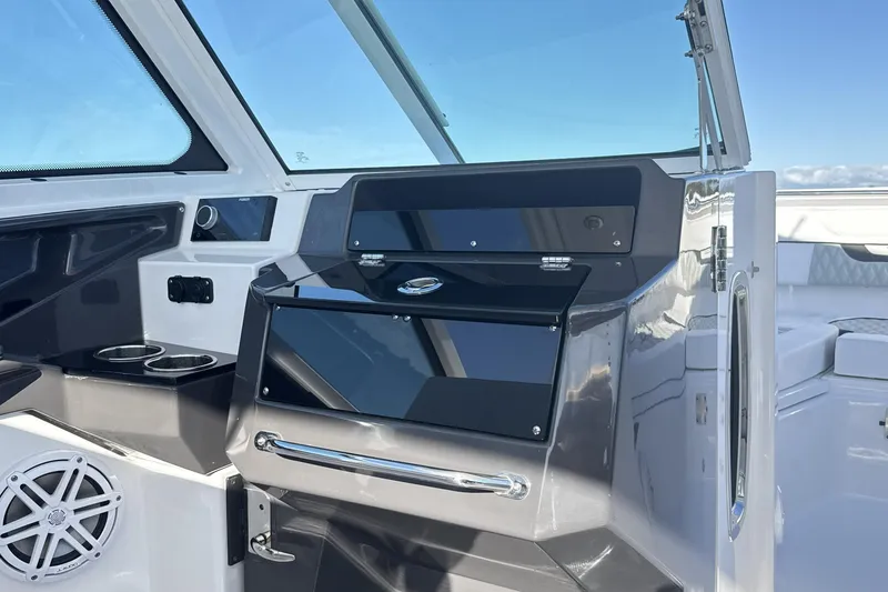 Slide: The Image of Luxurious seating on 2025 Blackfin 272 DC boat with scenic water view. - 45