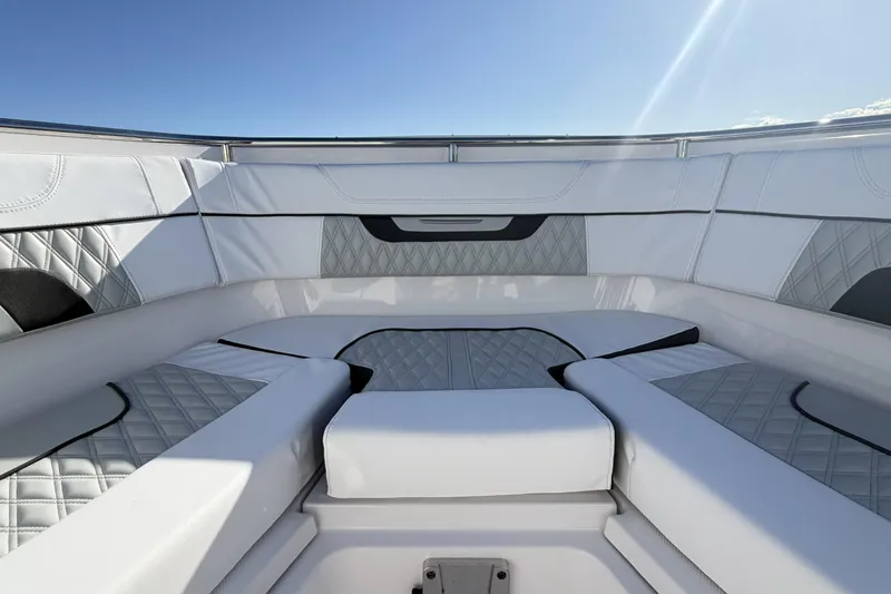 Slide: The Image of 2025 Blackfin 272 DC boat interior with modern helm and seating. - 51