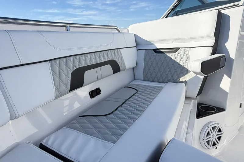 Slide: The Image of 2025 Blackfin 272 DC boat interior with speaker and storage compartment. - 54