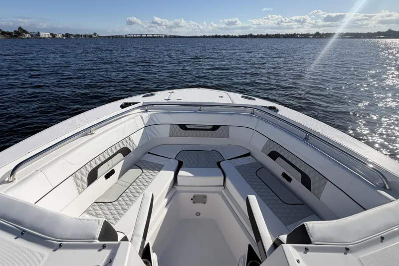 Slide: The Image of 2025 Blackfin 272 DC boat interior with sleek white design and modern features. - 55