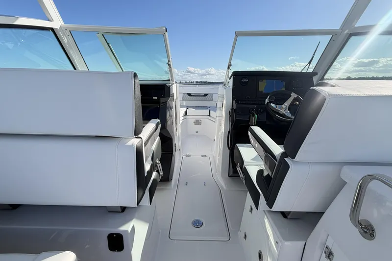 Slide: The Image of 2025 Blackfin 272 DC boat interior with compact bathroom and toilet. - 56