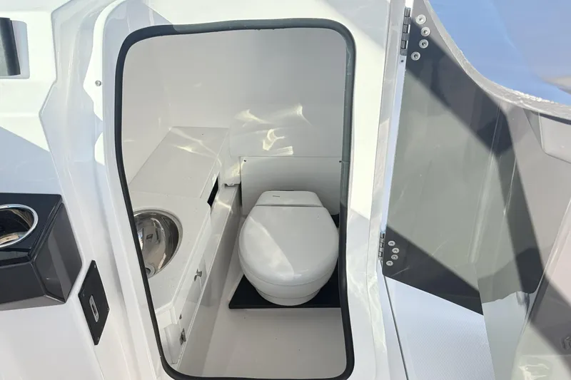 Slide: The Image of Electrical panel inside 2025 Blackfin 272 DC boat, featuring 12 volts DC system. - 61