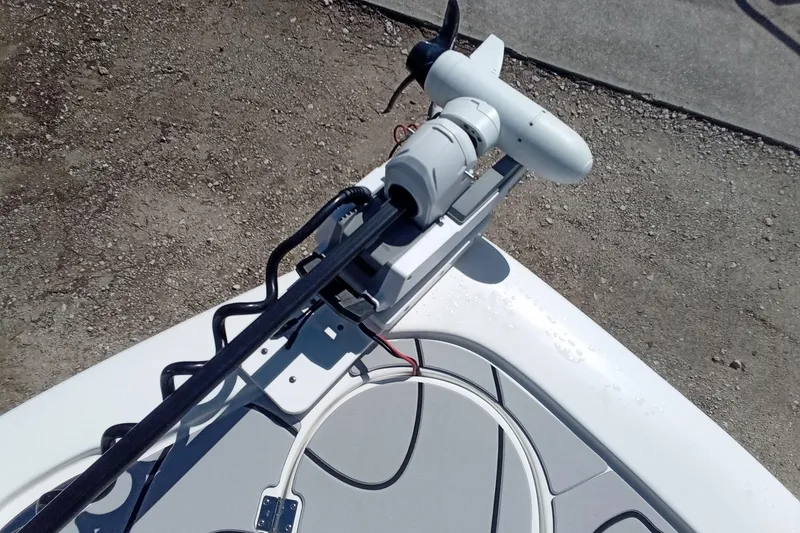 Slide: The Image of 2023 Tidewater 2700 Carolina Bay boat with mounted trolling motor. - 17