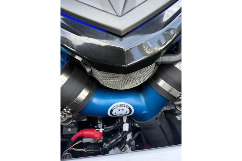 Slide: The Image of Close-up of 2024 Nautique Super Air Nautique S23 engine components. - 17