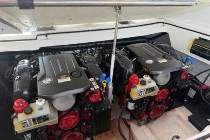 Slide: The Image of 2024 Cobalt R30 boat engine compartment with dual engines. - 1