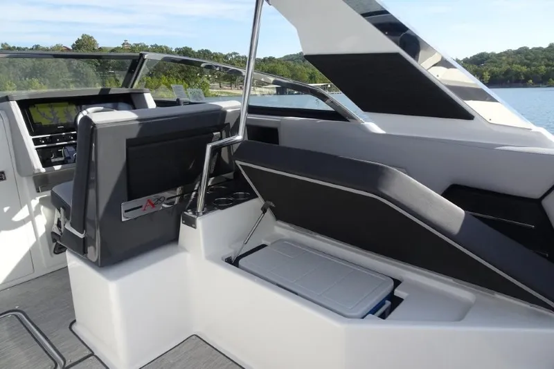 Slide: The Image of 2026 Cobalt A29 boat interior with sleek seating and modern dashboard design. - 10