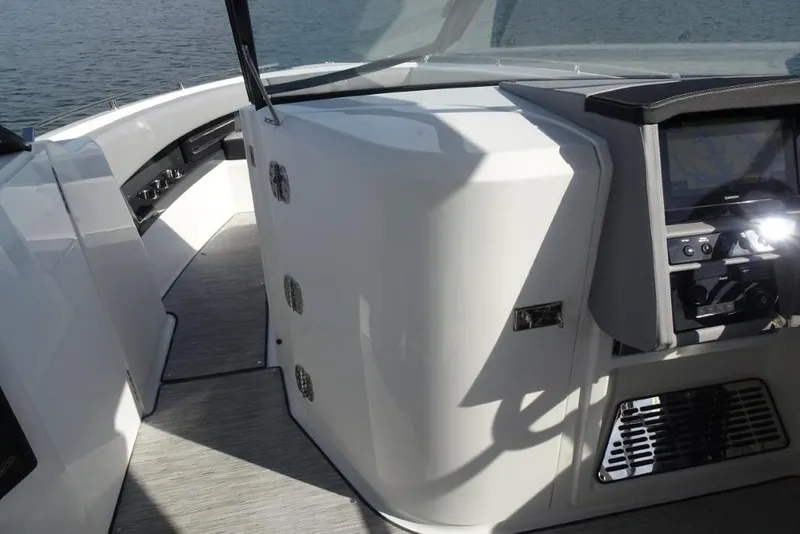 Slide: The Image of 2026 Cobalt A29 boat interior with sleek dashboard and navigation system. - 15