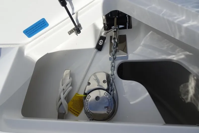 Slide: The Image of Anchor compartment of 2026 Cobalt A29 boat with chain and rope. - 22