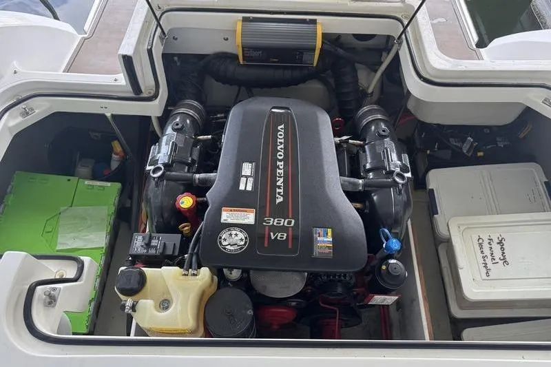 Slide: The Image of Anchor winch system on 2015 Cobalt R7 boat, featuring a secure chain and rope setup. - 8